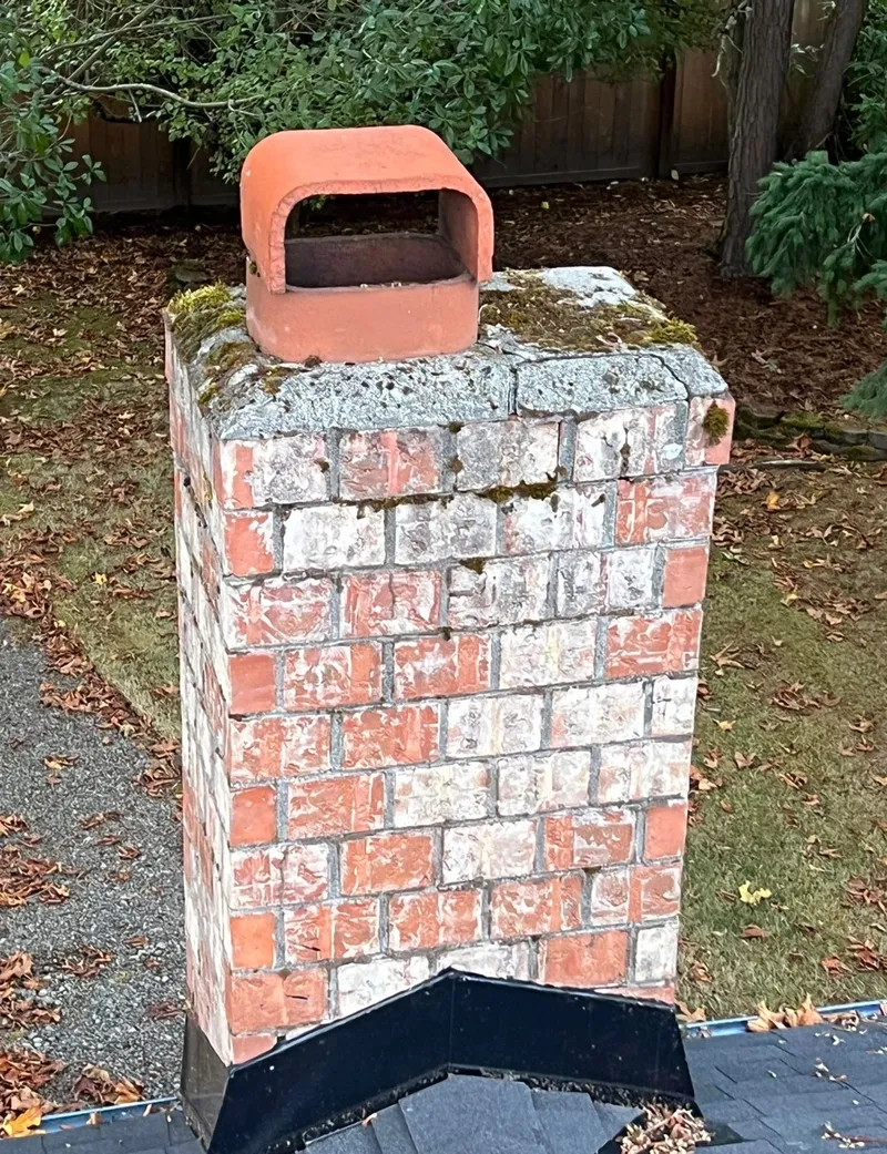 Chimney crown and cap area before repair