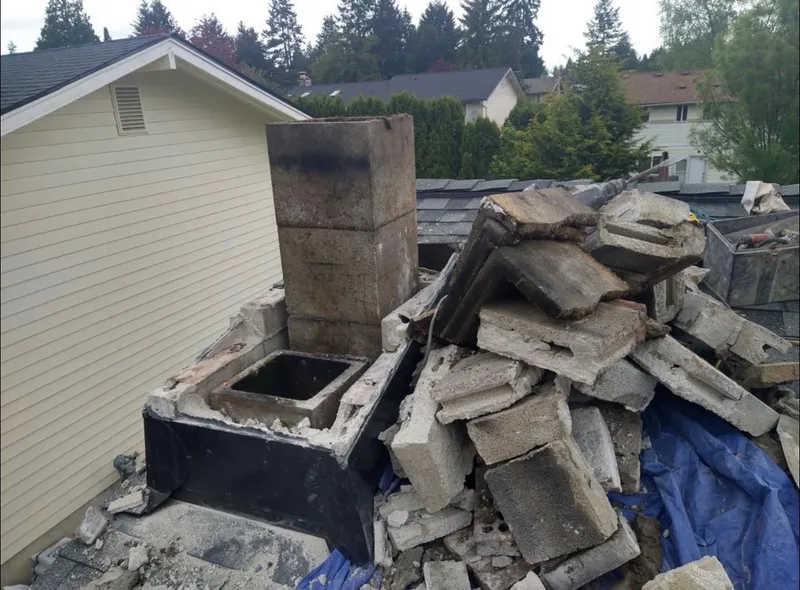 Chimney rebuild work after damaged masonry removal