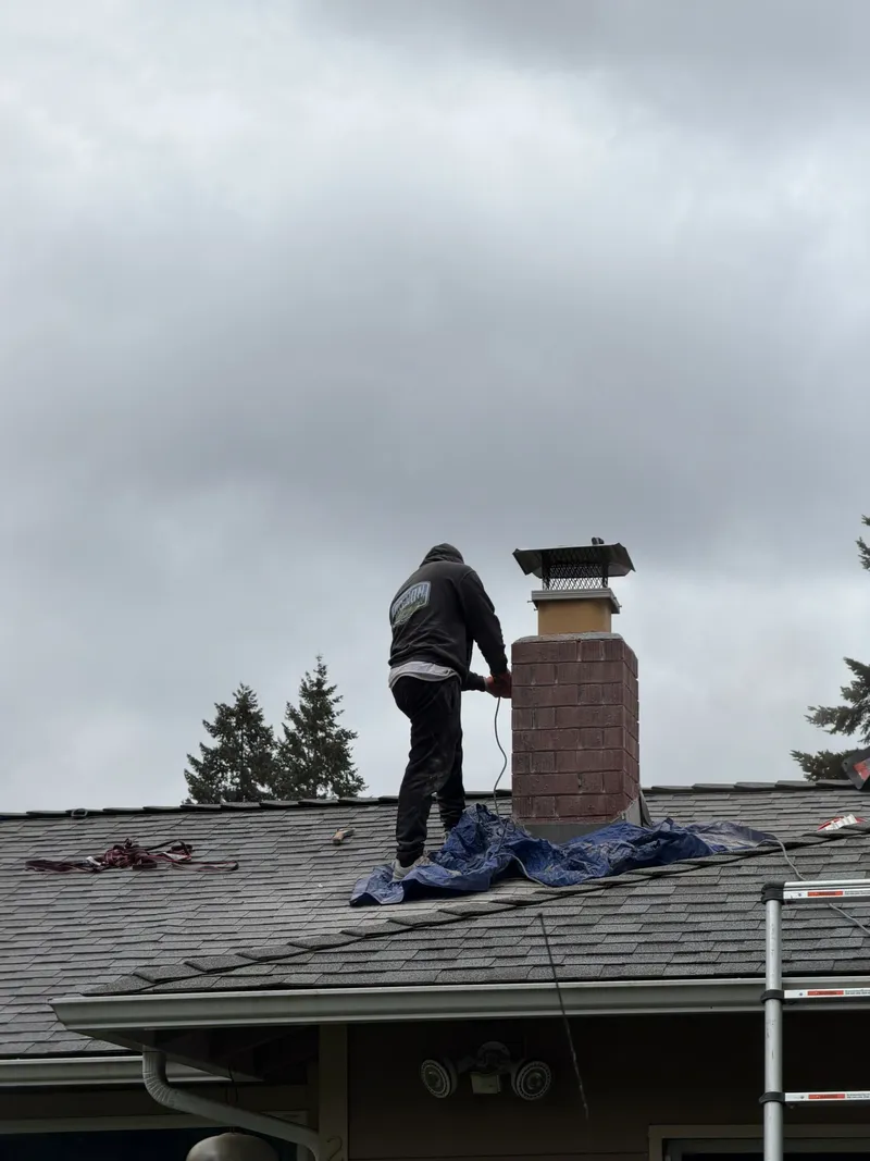Chimney waterproofing in Seattle WA — vapor-permeable sealer application for Pacific Northwest masonry chimneys