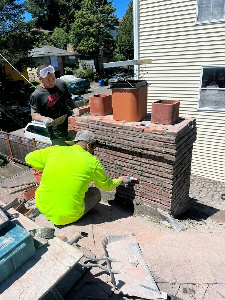 Chimney repointing in Seattle WA — tuckpointing and mortar joint repair for pre-war masonry chimneys